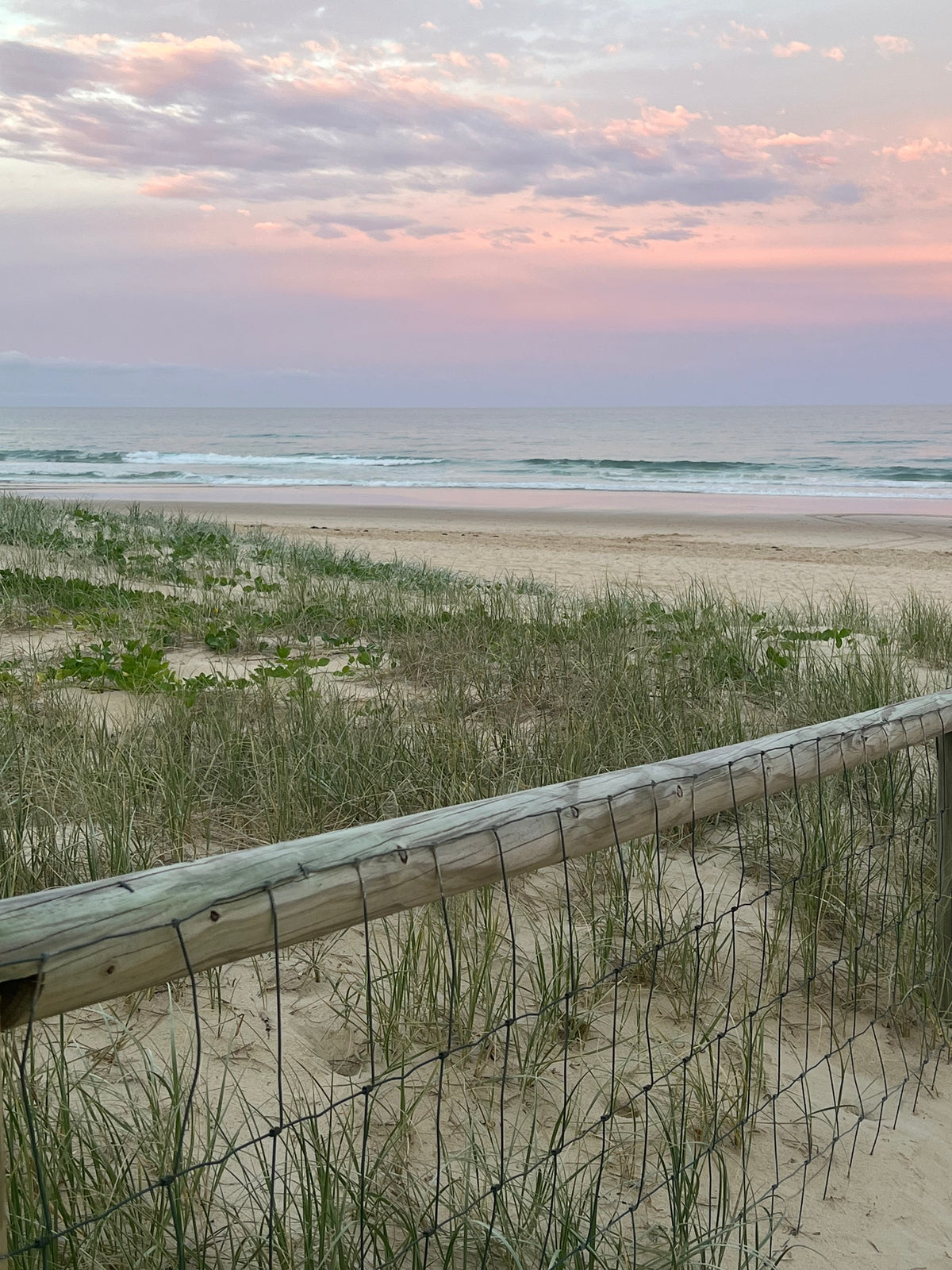 Unframed Broadbeach beach print showing dunes, fence, and ocean waves