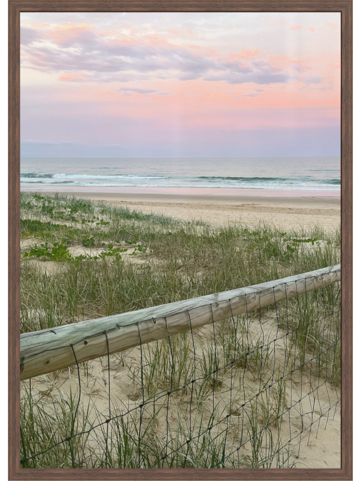 Dark brown wood framed beach art with smooth finish and white mat edge