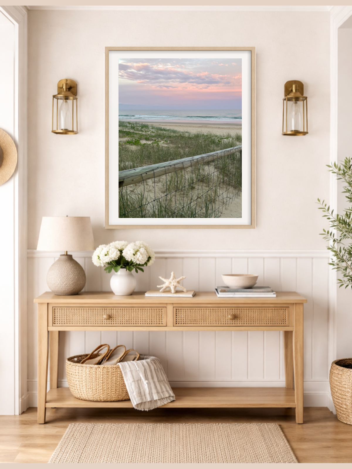Framed Broadbeach wall art hanging above console table in living room