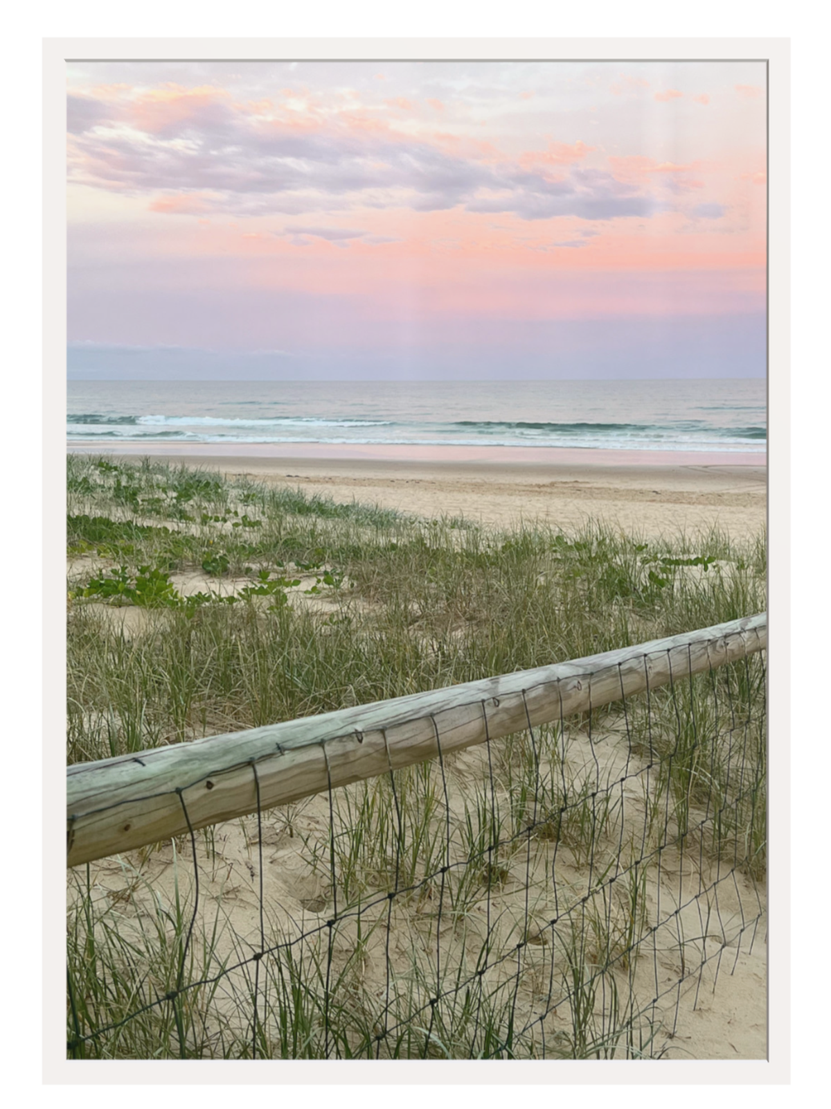 Neutral tone wood frame beach print with thin off-white border