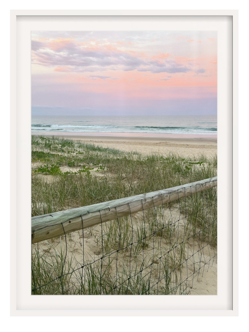 White framed coastal art print with thick mat showing dune grasses