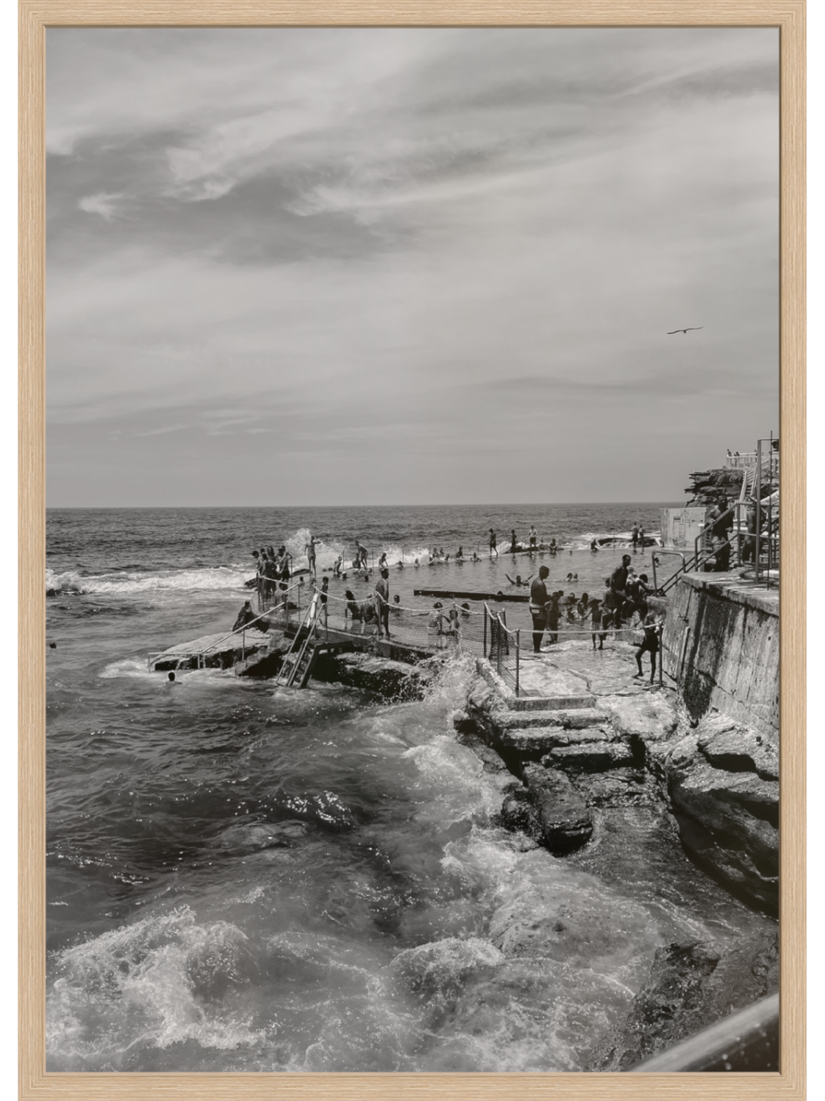 Bronte III B&W Sydney bath print in light wood frame showing motion
