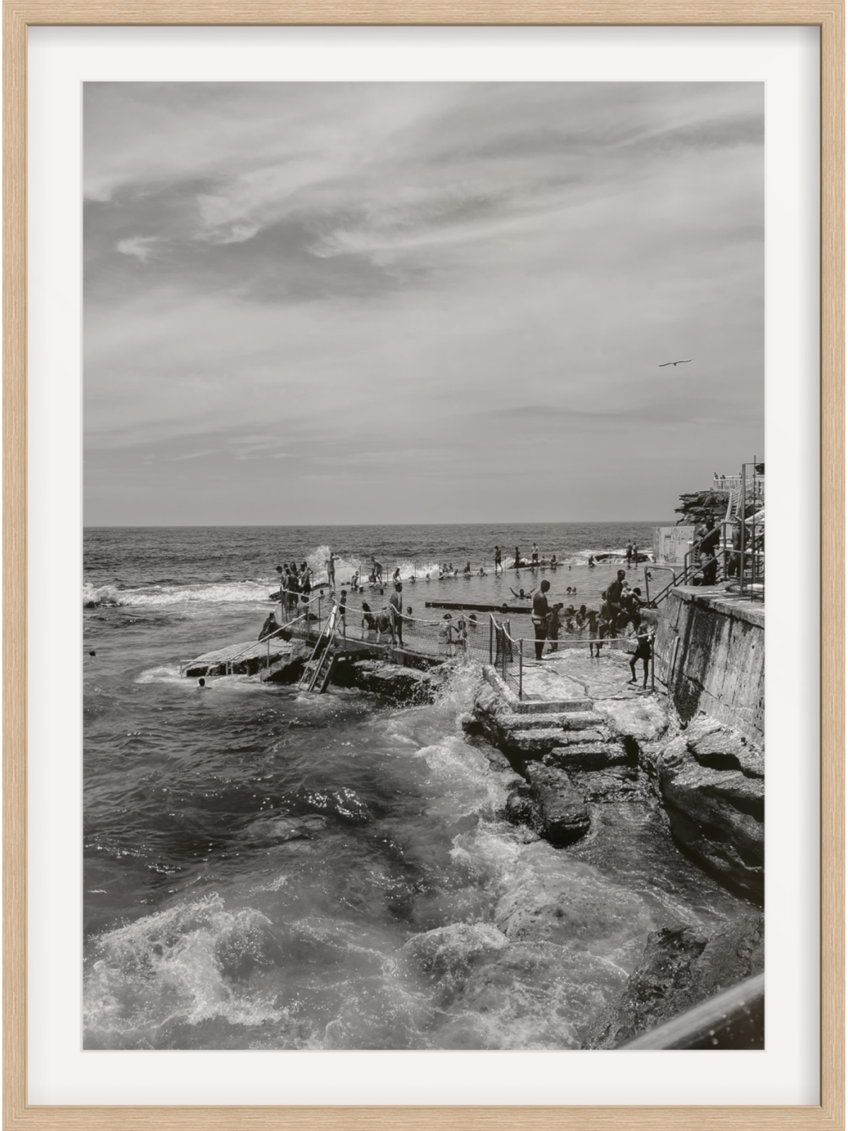 Bronte III B&W Sydney coastal scene in light wood frame with wide mat