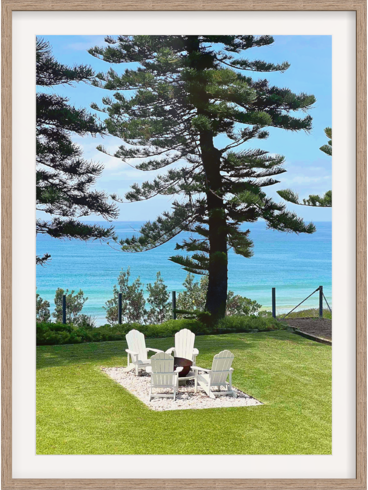 Culburra Beach House framed print in light wood with wide white mat border