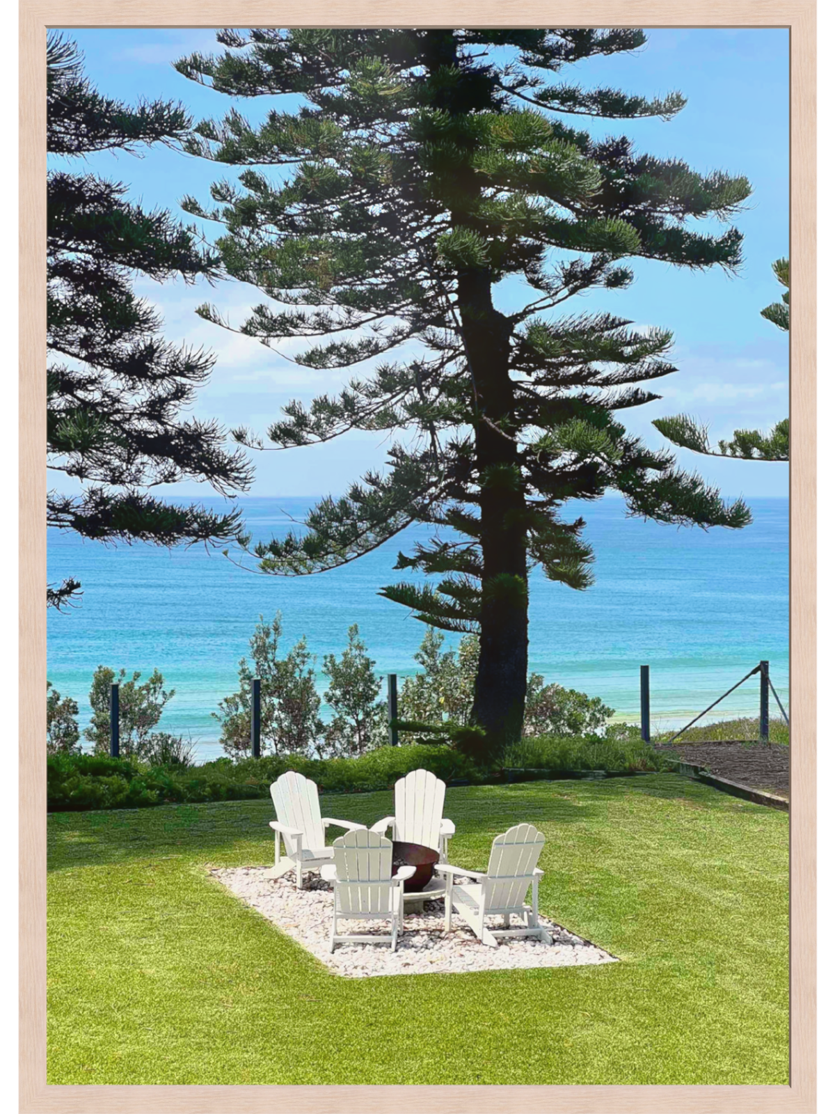 Light wood framed Culburra Beach House print with wide white mat