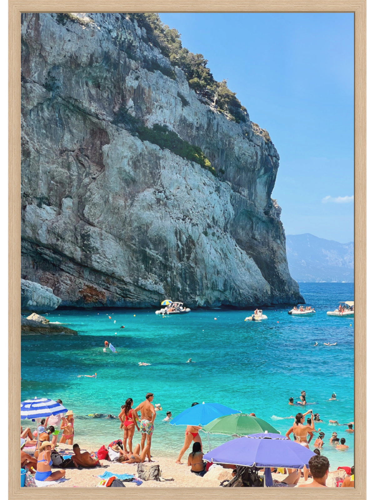 Sardinia Cala Mariolu Beach wall art in light wood frame with turquoise water and limestone cliffs
