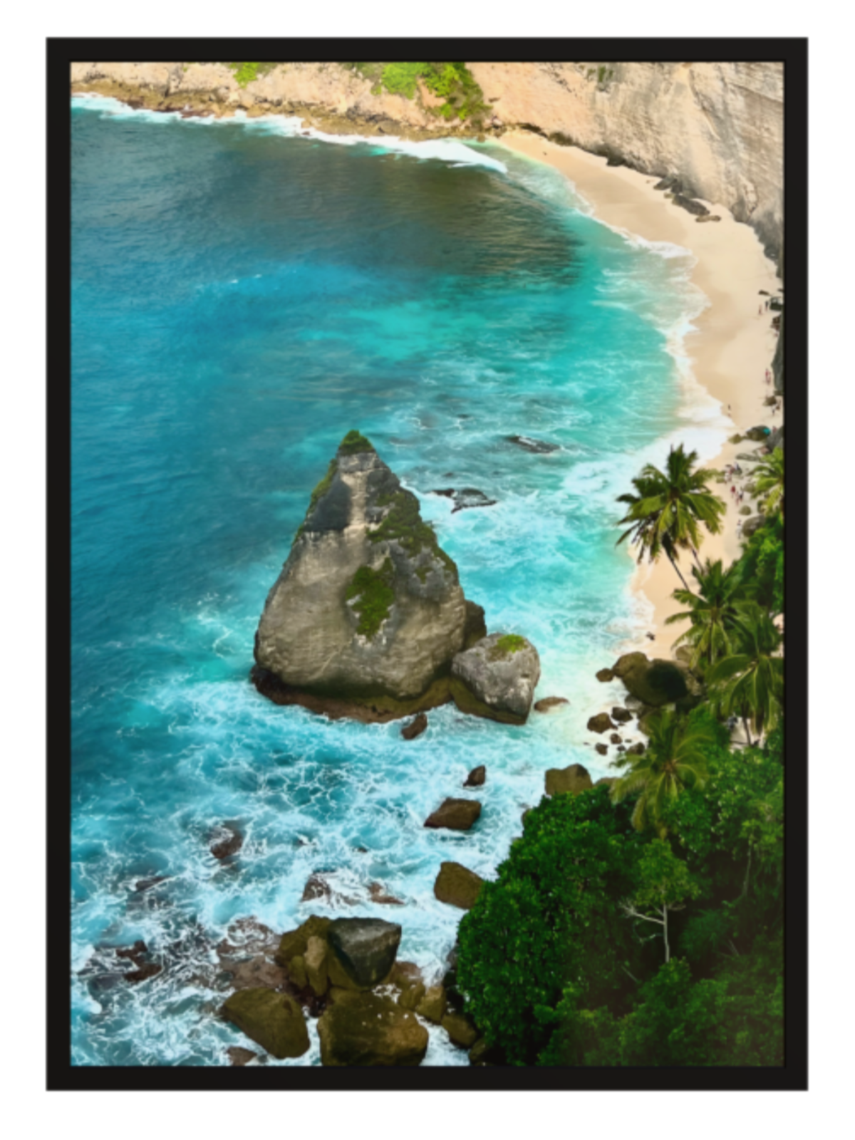 black frame Aerial view of a tropical beach with turquoise waters and rocky outcrops.