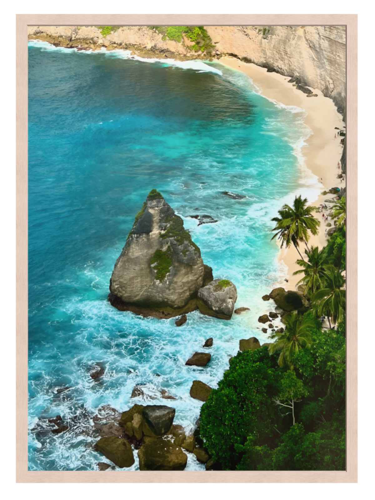Light oak frame Aerial view of a tropical beach with turquoise waters and rocky outcrops.