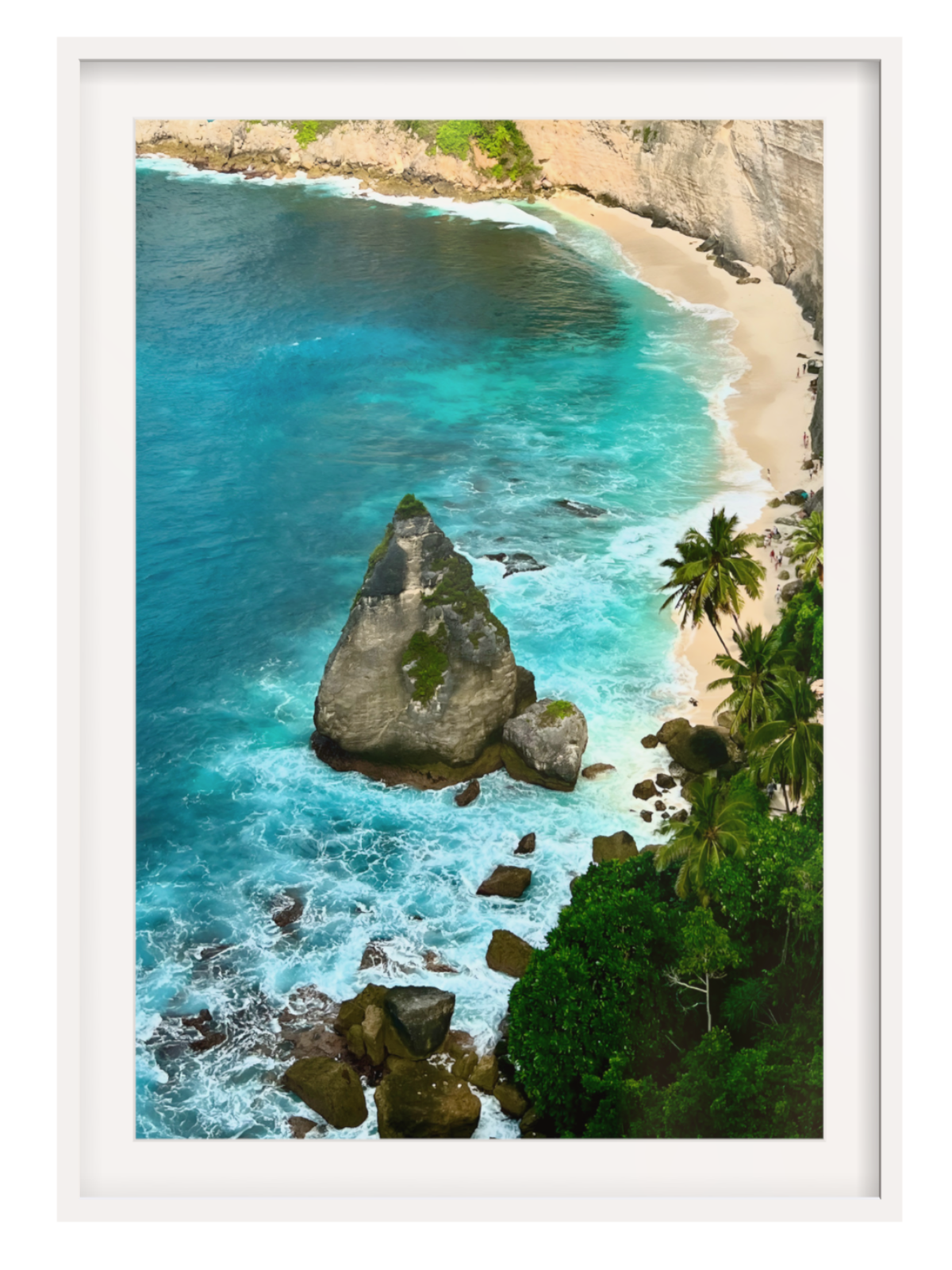 White frame with border Aerial view of a tropical beach with turquoise waters and rocky outcrops.