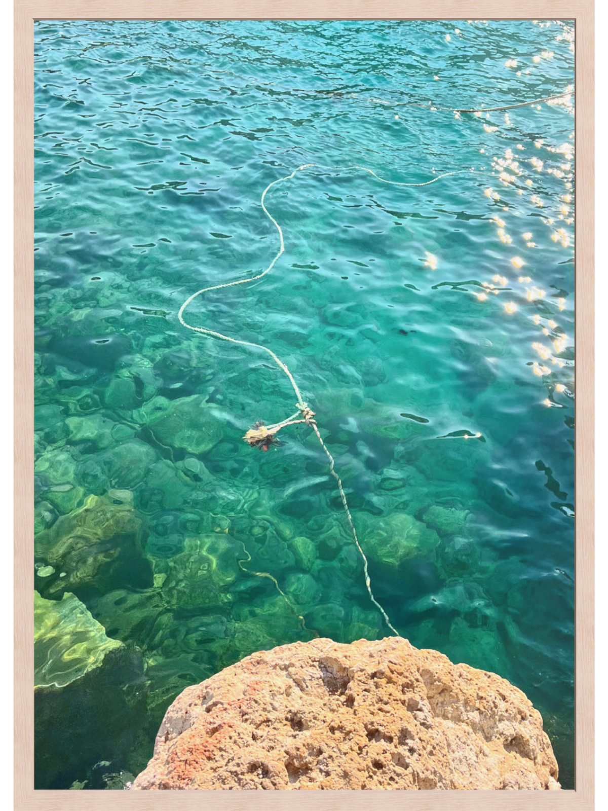 Firopotamos III natural wood frame wall art print of Milos turquoise water and rope detail