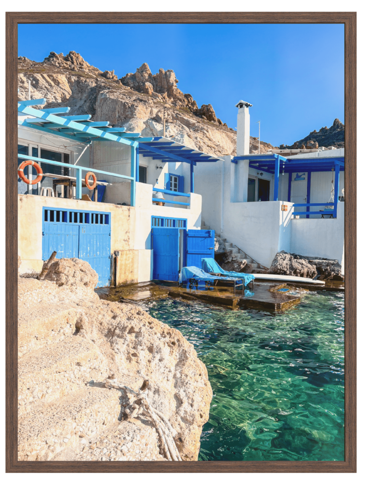 Firopotamos coastal wall art in wooden frame showing volcanic cliffs and blue sky