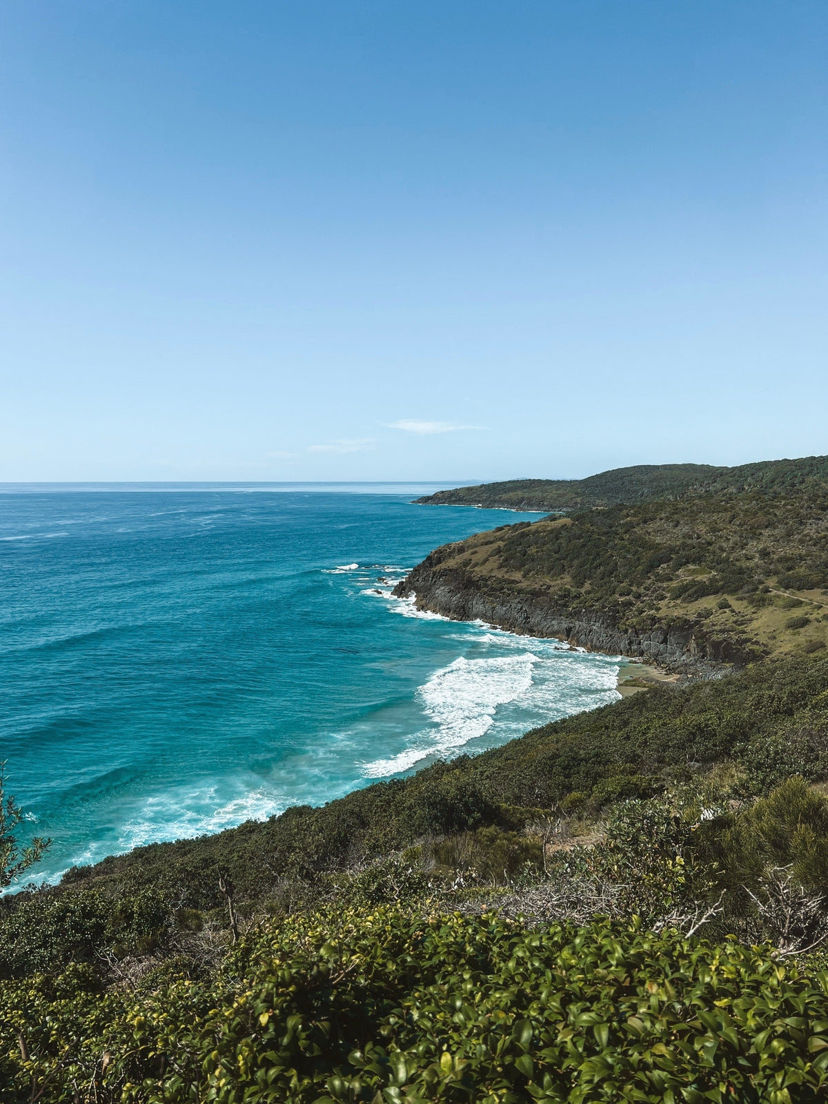 Unframed Hat Head Australia coastal landscape print of turquoise ocean and green headland for home decor