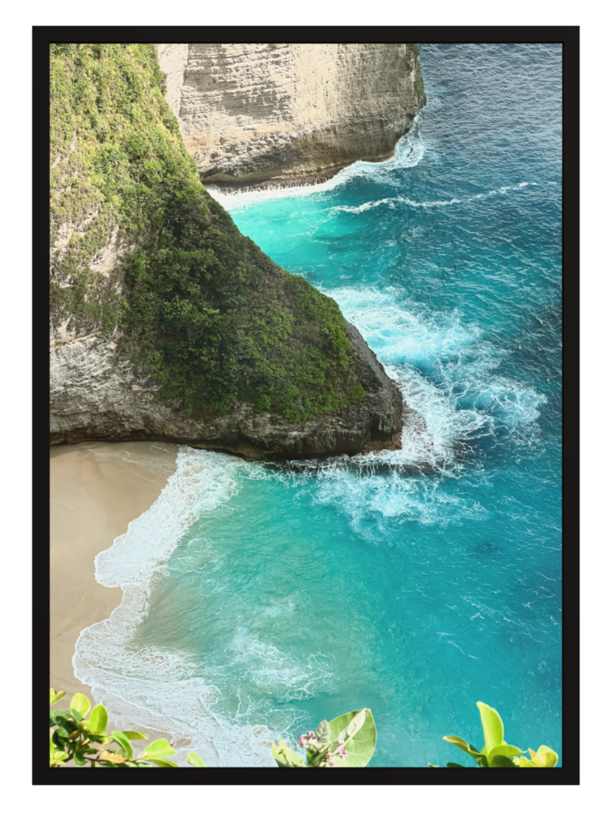 Black frame Beach scene with turquoise water and rocky cliffs