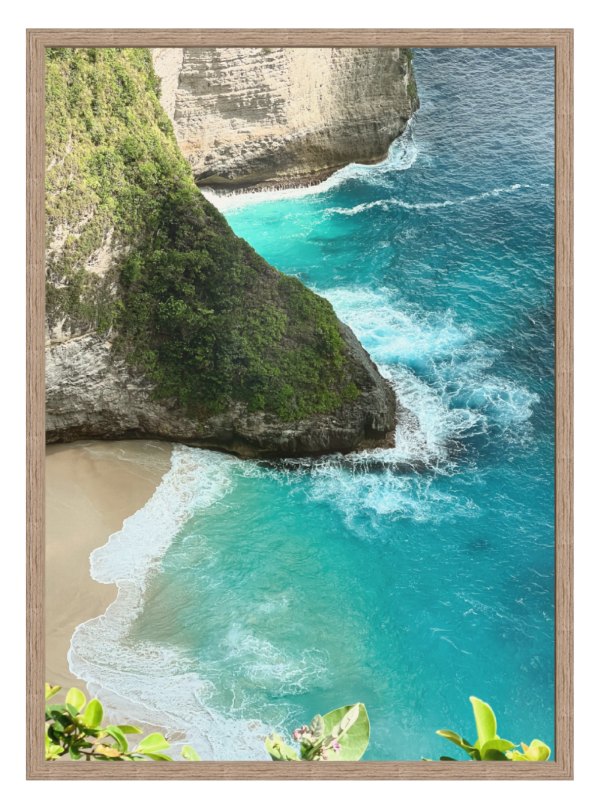Hazel Framed photograph of a tropical beach with turquoise water and cliffs.