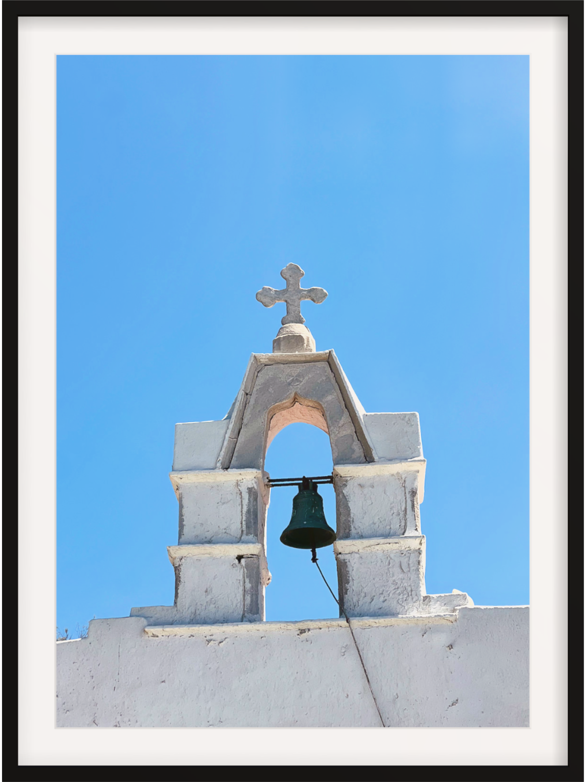 Low angle Mykonos church tower wall art with wide white mat