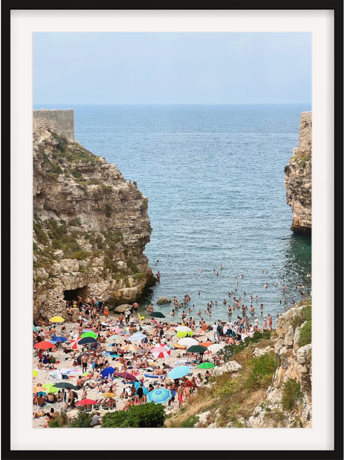 Polignano a Mare Italy coastal wall art print in black frame with white mat