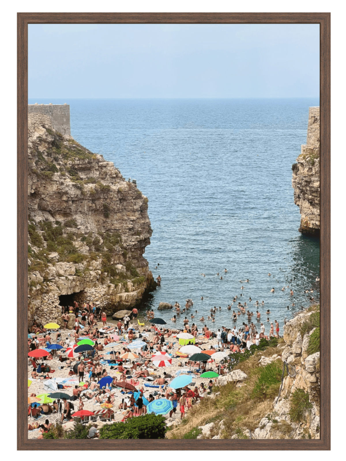 Polignano a Mare Italy cliffside beach wall art in dark wood frame no mat