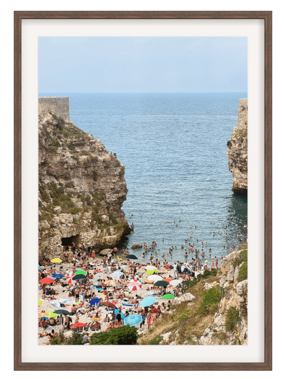 Polignano a Mare Italy pebble beach wall art in dark brown wood frame