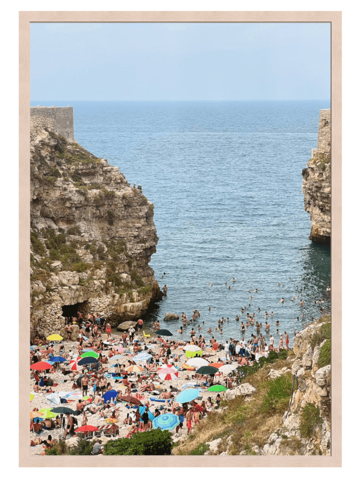 Polignano a Mare Italy stratified cliffs wall art in light wood frame