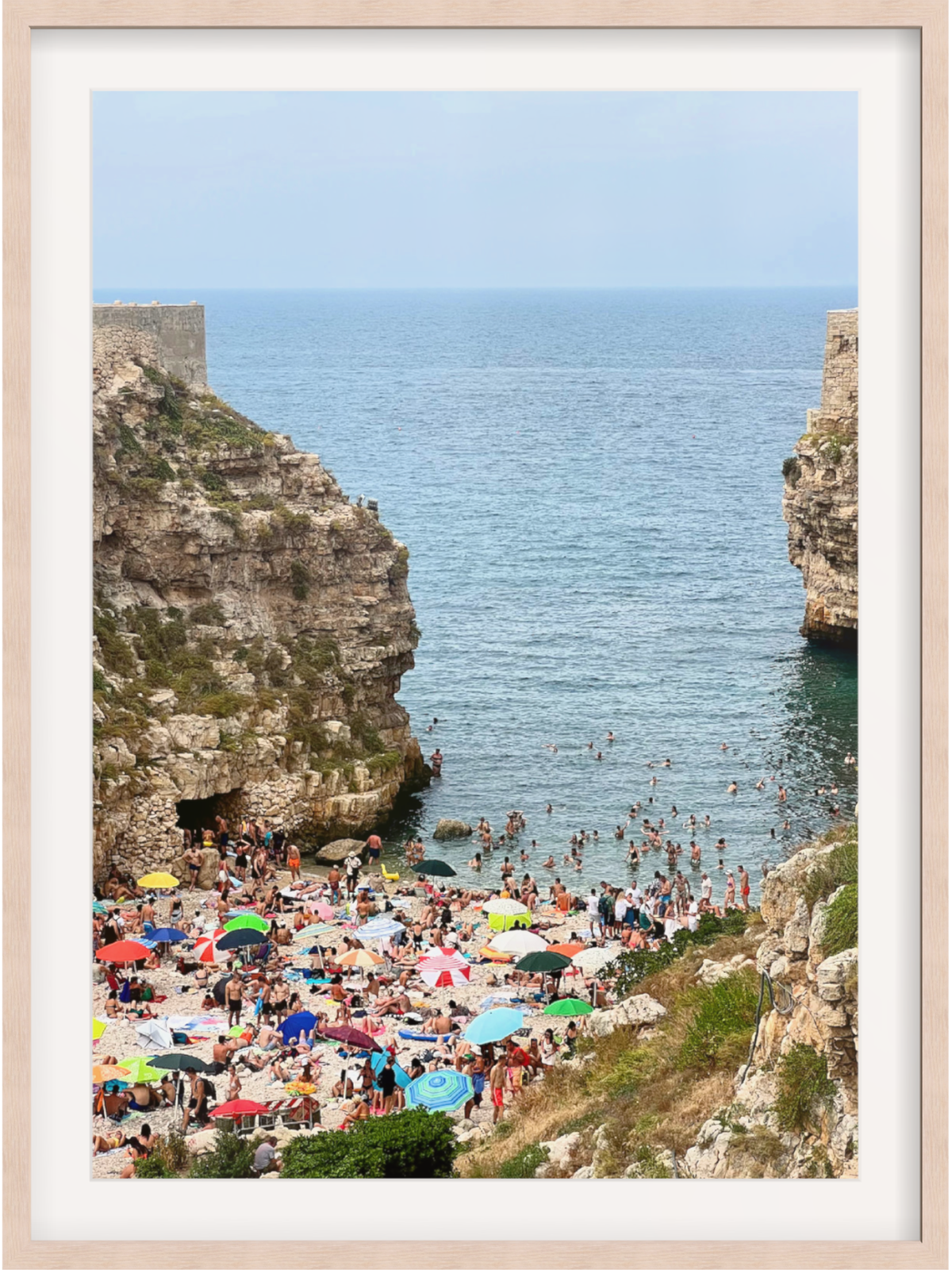 Polignano a Mare Italy coastal scene wall art in light natural wood frame