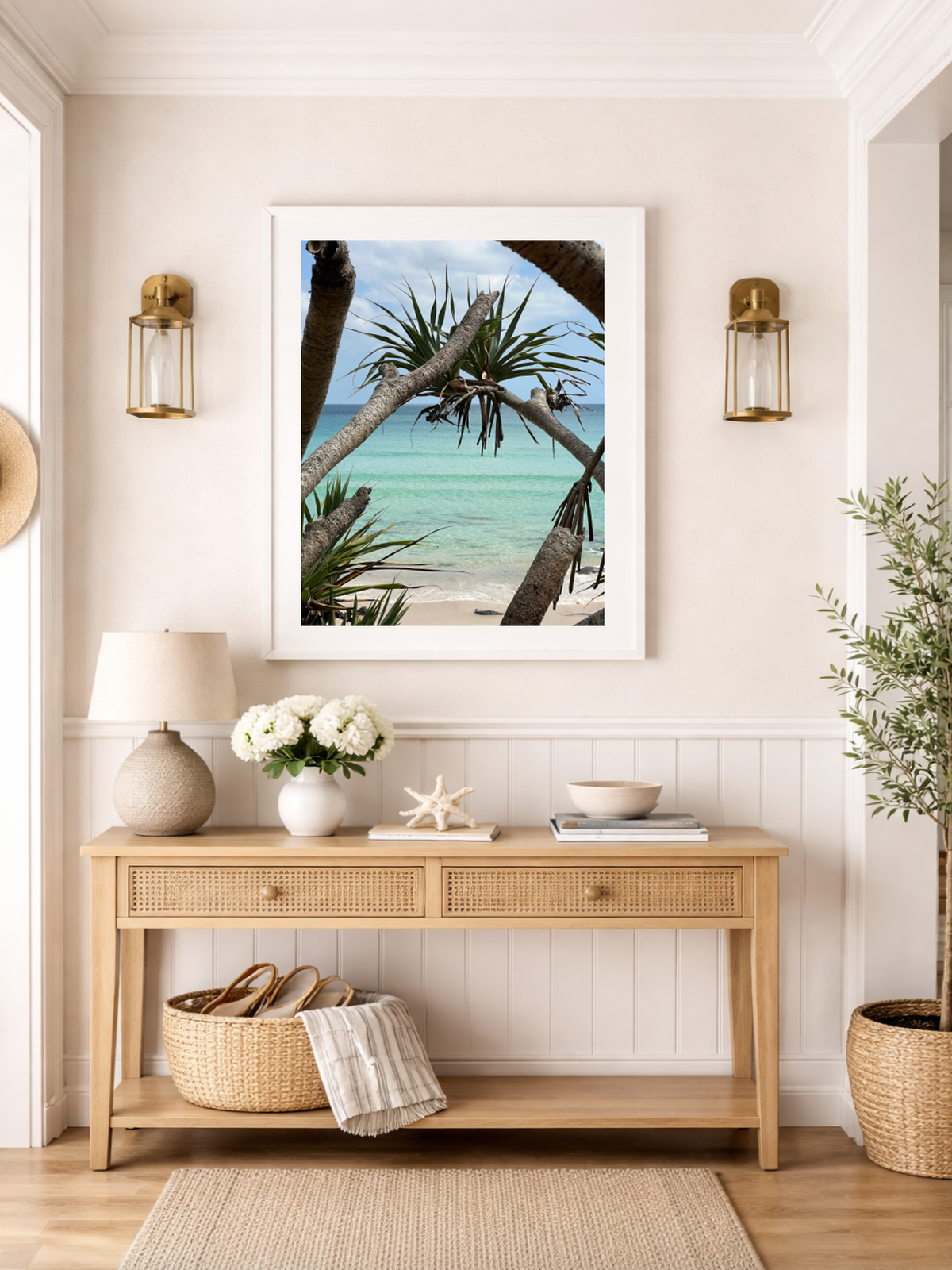 Rainbow Bay Australia framed wall art hanging above console table in styled living room