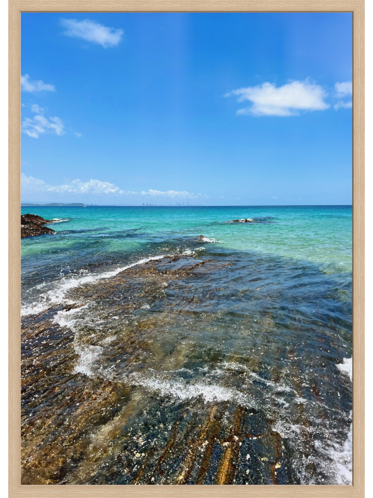 Beach scene with clear blue water and sky