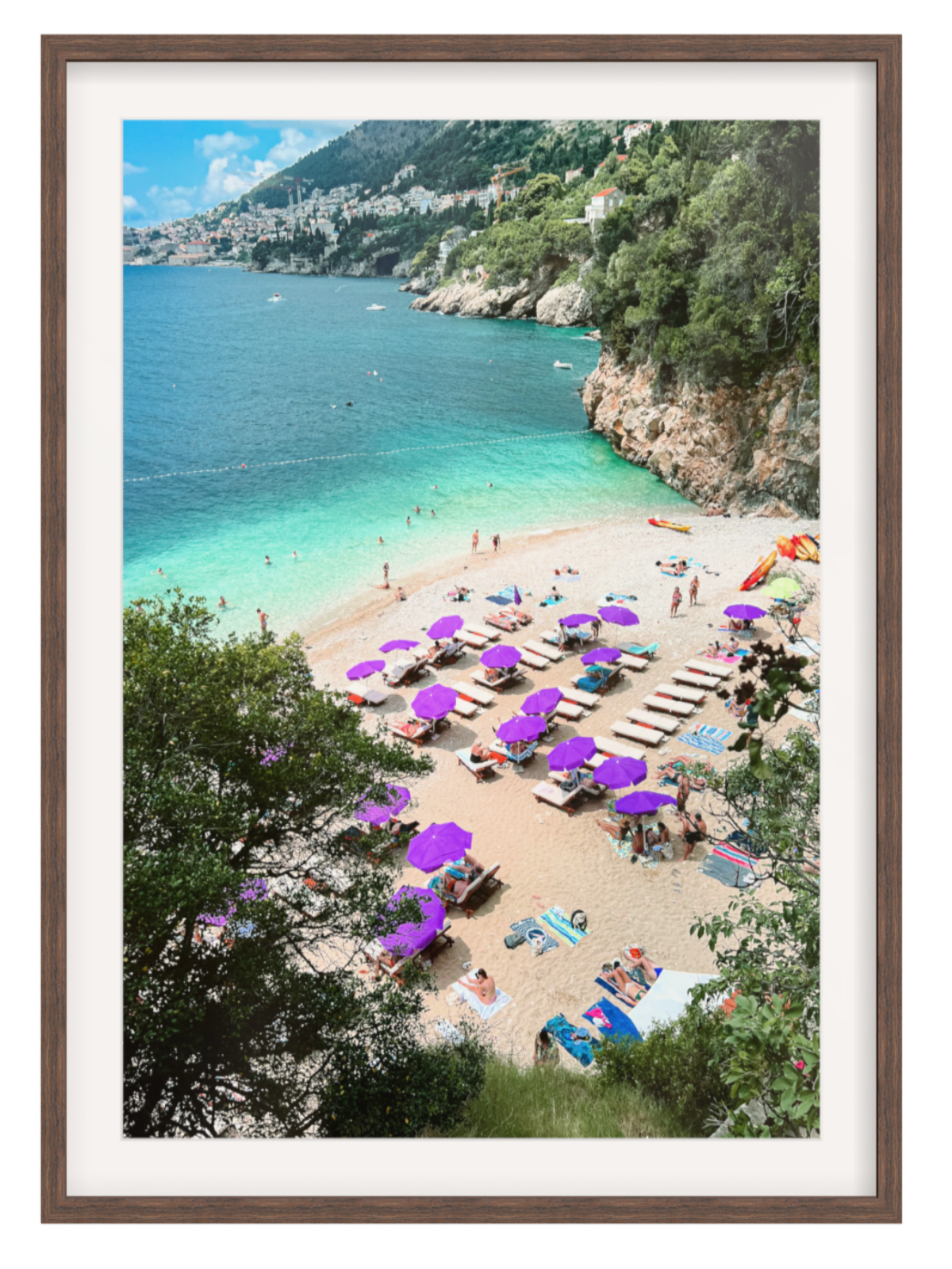 Beach scene with purple umbrellas and people near turquoise water, framed picture.