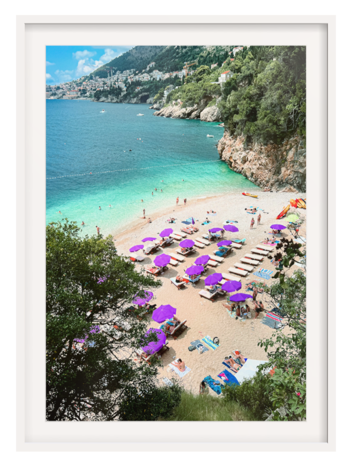 Beach scene with purple umbrellas and people enjoying the sun, framed picture.