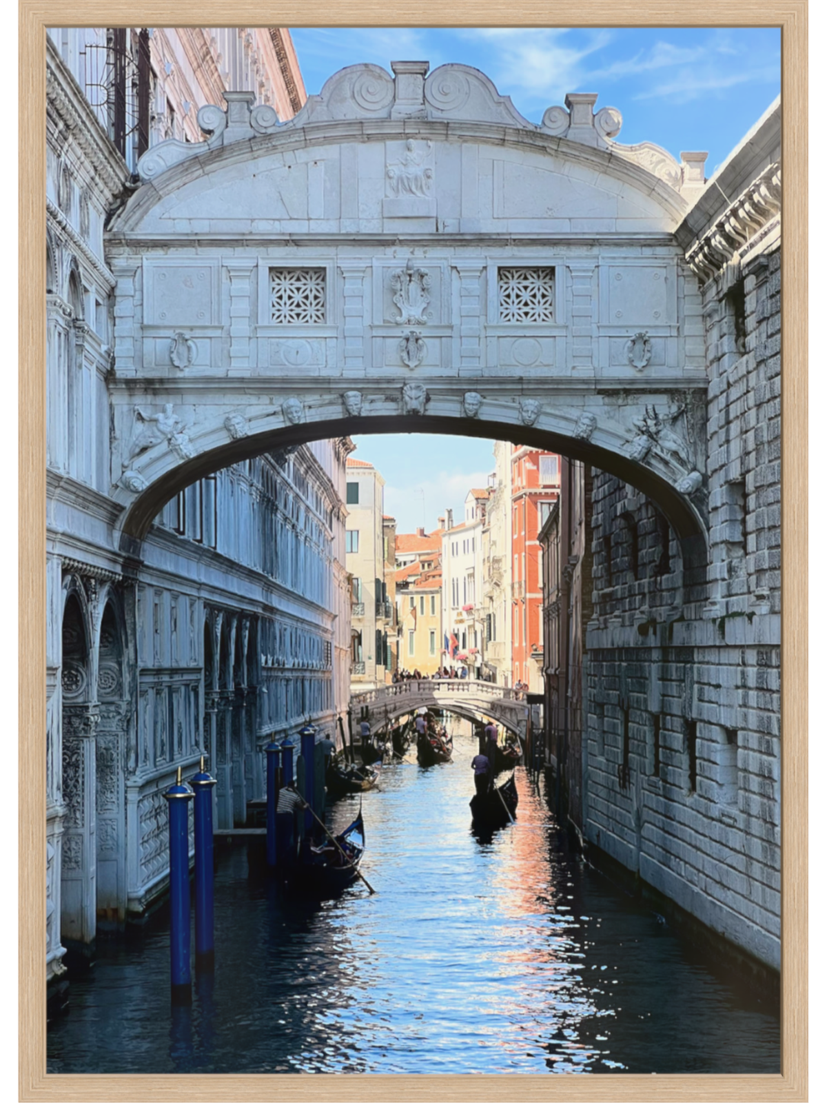 Bridge of Sighs framed print featuring blue sky and gondolas