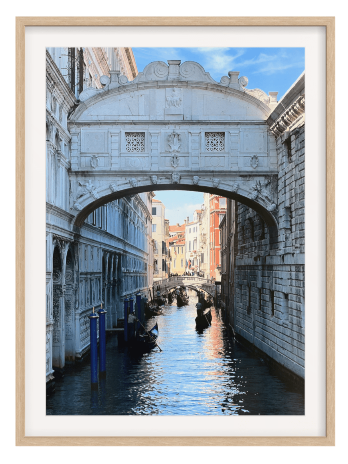 Framed Venice canal scene with gondolas in natural wood frame