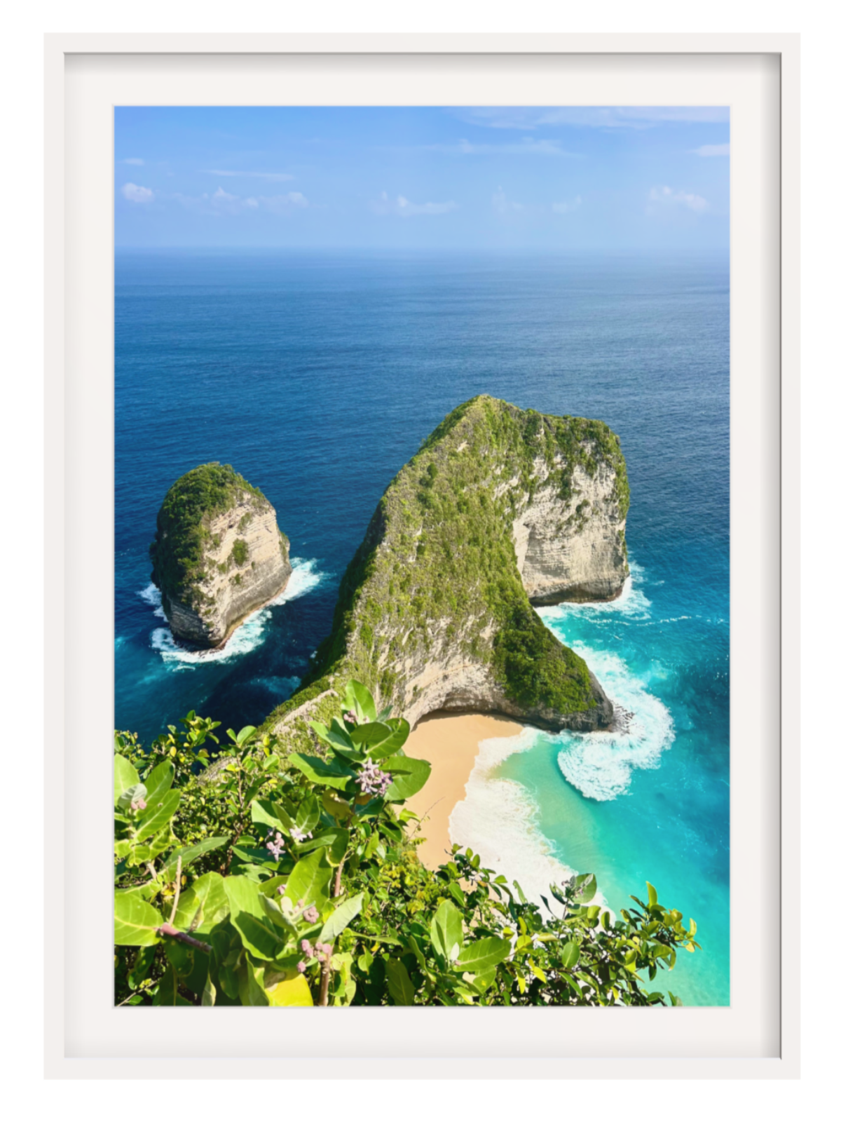white frame with border Vibrant tropical landscape with rocky outcrops and a sandy beach.