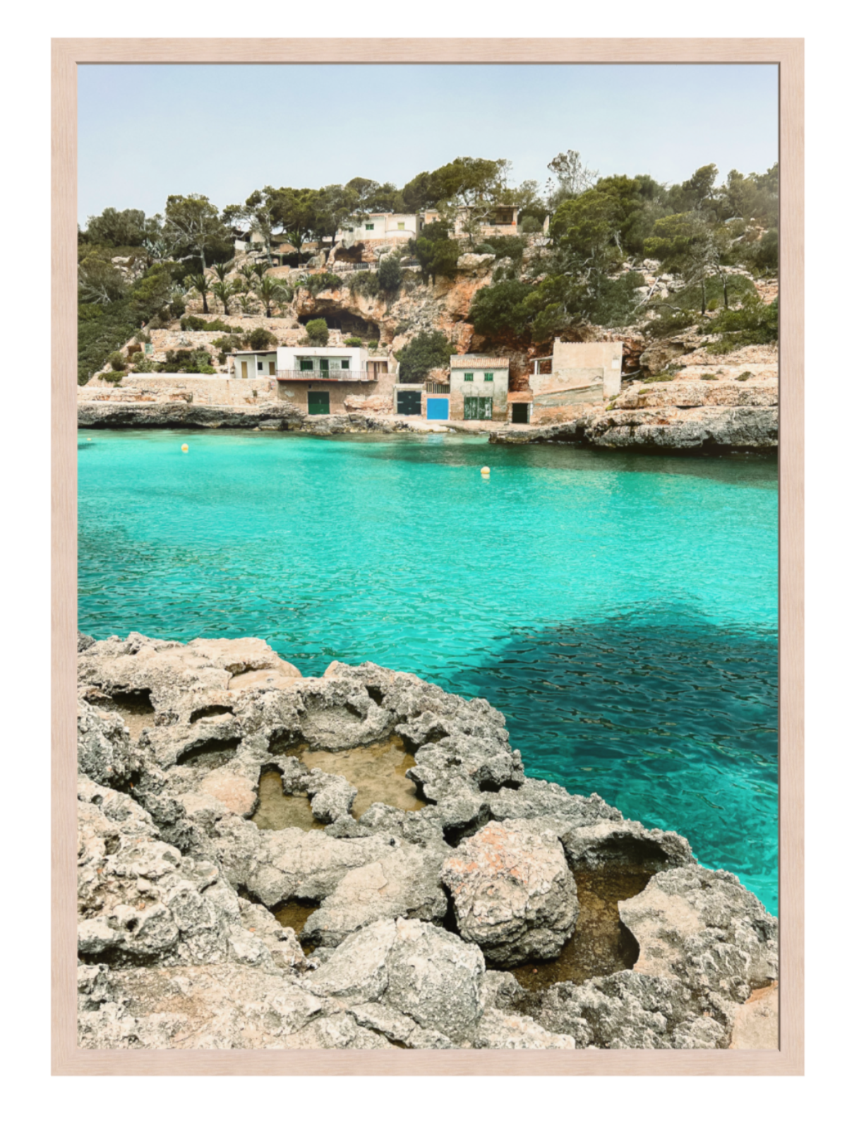 Coastal scene with turquoise water and rocky foreground