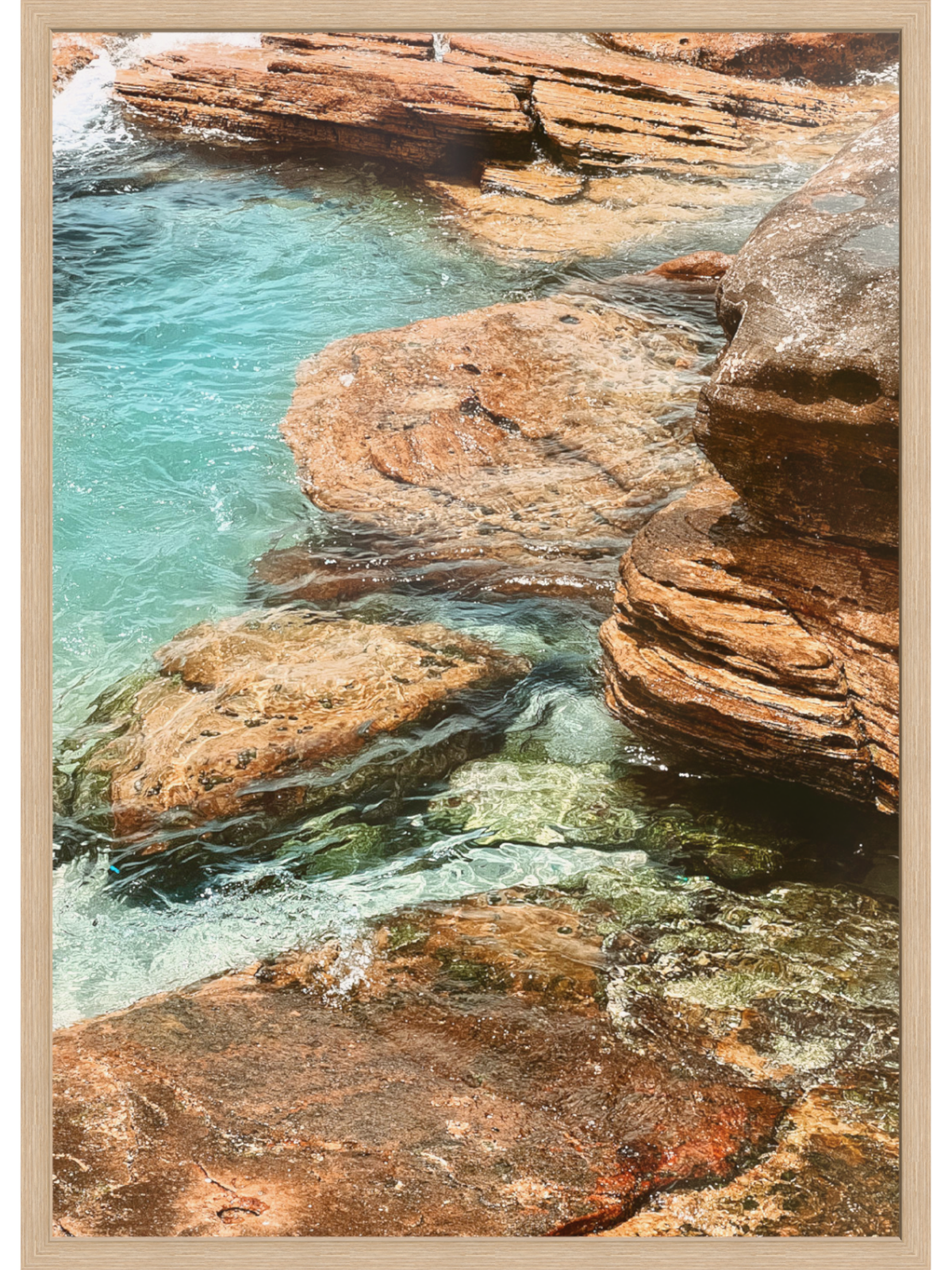 Rocks with clear blue water in a natural setting